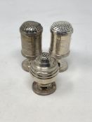 Three Georgian silver salt and pepper sifters,