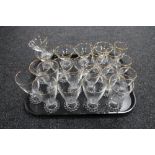 A tray of drinking glasses