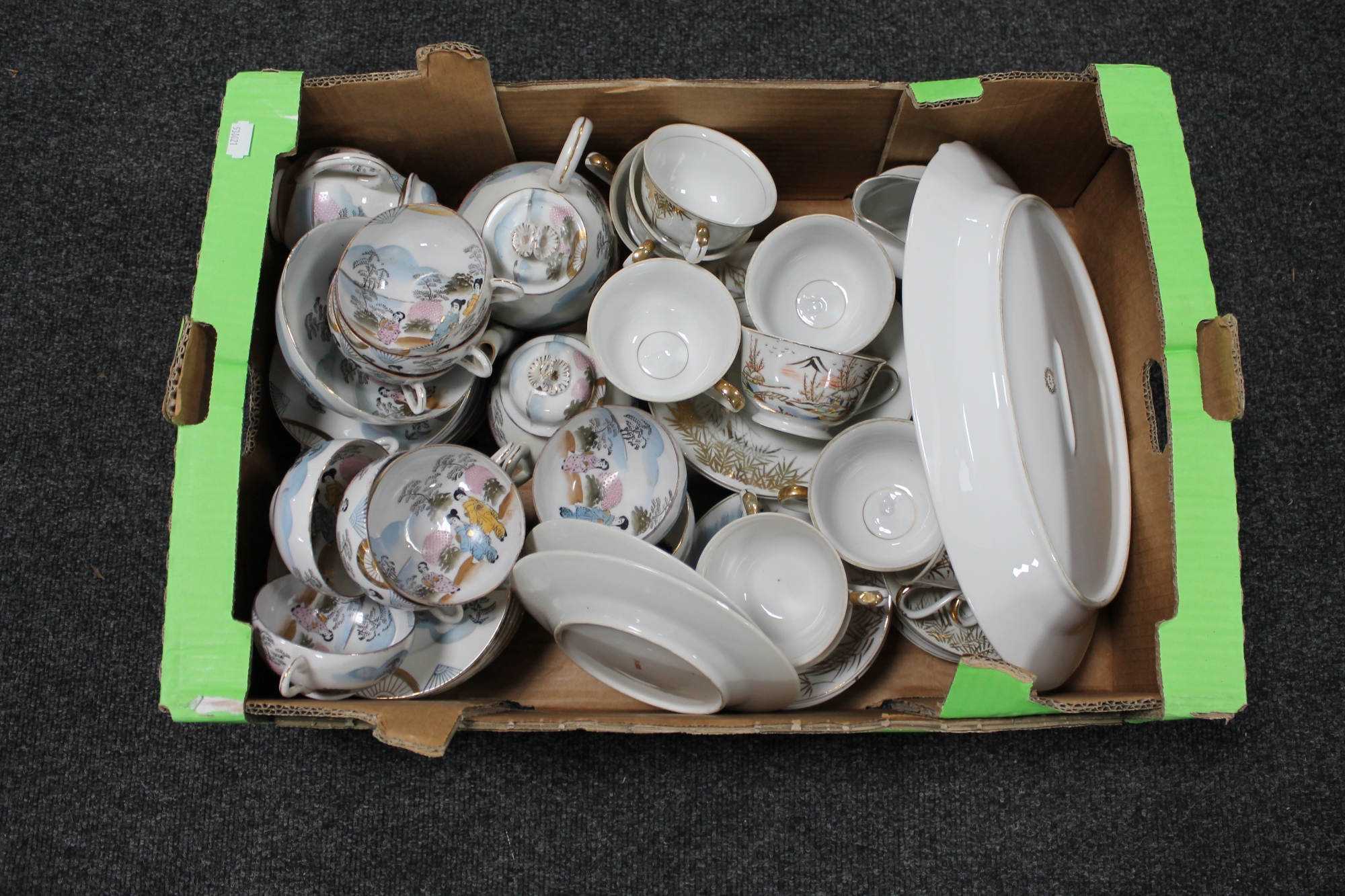 A box of Japanese dinner service and an eggshell tea service