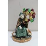 A Royal Doulton figure - The Windmill Lady HN1400 (a/f) CONDITION REPORT: A rare