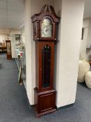 A contemporary Tempus Fugit longcase clock