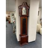 A contemporary Tempus Fugit longcase clock