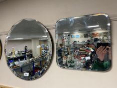 Two Art Deco style un-framed mirrors