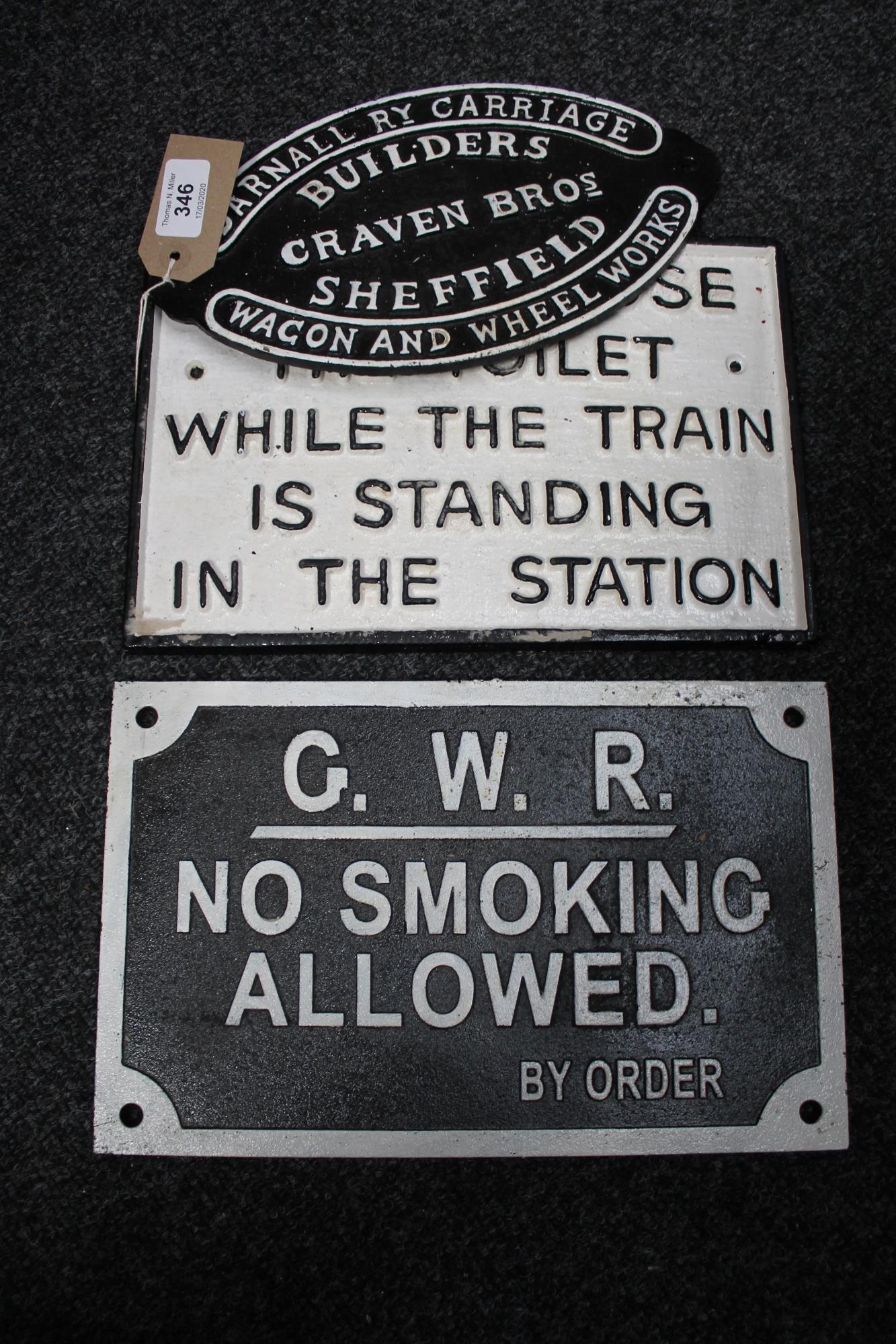 Three cast iron railway plaques