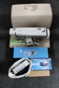 A cased New Home electric sewing machine, box of electricals - Konig digital sat receiver,