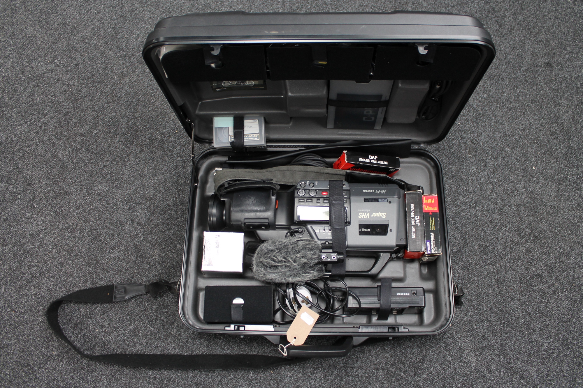 A JVC video camera in case with accessories