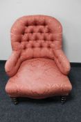 An Edwardian lady's chair in pink button floral fabric