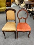 Two antique mahogany dining chairs