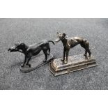 Two cast iron figures of dogs