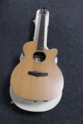 A Tanglewood Evolution TSF CE N electro acoustic guitar in case