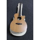 A Tanglewood Evolution TSF CE N electro acoustic guitar in case