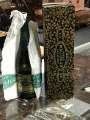 A bottle of Bollinger Champagne RD Tradition Vintage 1973, in original presentation carton,