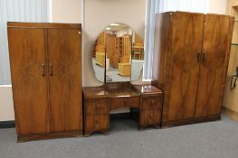 A three piece 1930's walnut bedroom suite