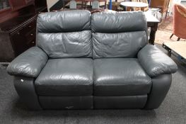 A two seater leather reclining settee