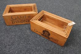 Two sets of four graduated "Game of Thrones" boxes