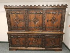 A good quality carved oak sideboard, with castellated frieze,