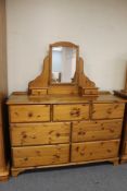 A pine seven drawer dressing chest