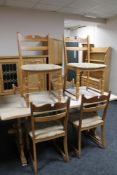 A blonde oak refectory dining table and six chairs