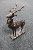 A cast iron stag figure