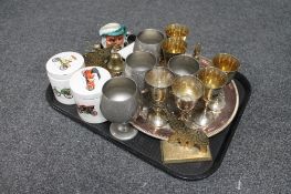 A collection of metal wares including a pair of brass elephant ornaments, two small brass bells,