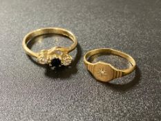 A 9ct gold signet ring and a 9ct gold dress ring CONDITION REPORT: 2.7g.