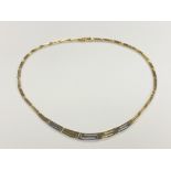 An 18ct gold two-tone necklace CONDITION REPORT: 19.
