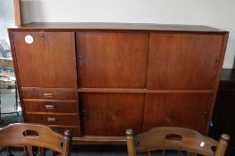 A mid 20th teak cocktail sideboard