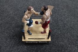 A cast iron novelty boxing bank money box