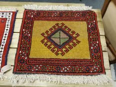 A fringed Caucasian mat,