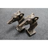 A pair of cast iron greyhound head bookends