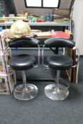 Two gas lift bar chairs