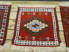 A fringed Caucasian mat,