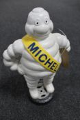 A cast iron figure - Michelin man