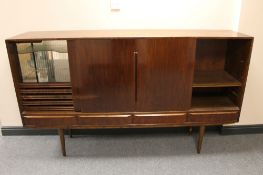 A mid 20th century walnut four cocktail sideboard CONDITION REPORT: Minor cosmetic
