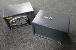A small metal safe and an electronic safe