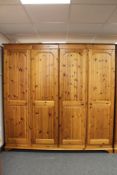 A pine four door wardrobe