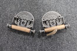 Two cast iron railway toilet holders