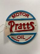 A cast iron plaque - Pratts oil