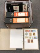 A box of three binders and further booklets of stamps