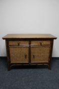 A colonial style double door sideboard