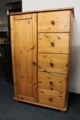 A pine child's wardrobe fitted five drawers