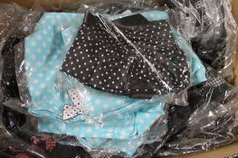 A box of Phaze polka dot pencil skirts,