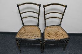 A pair of ebonised bergere seated bedroom chairs