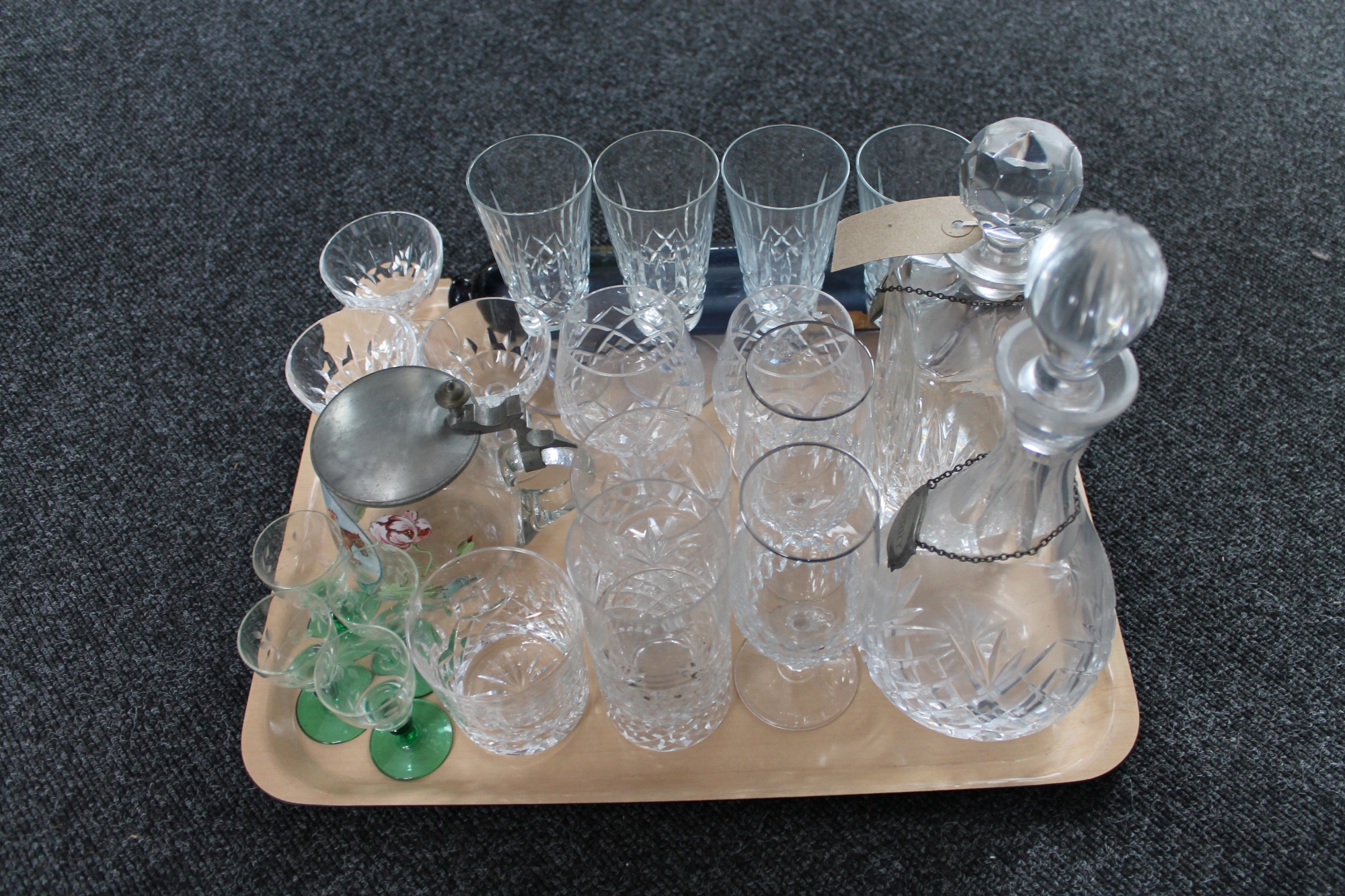 A tray of glass ware - antique blue glass, antique rolling pin, two decanters with labels,