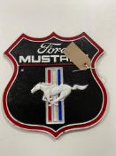 A cast iron plaque - Ford Mustang