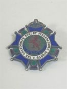 A silver and enamel medal for the Caledonian society of Johannesburg