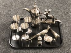 A tray of silver plated pheasant ornaments, condiments, set of four goblets,