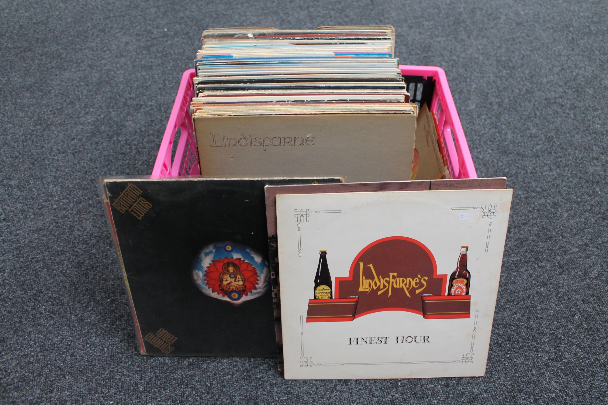 A box of vinyl LP records to include Santana, Bob Dylan, Lindisfarne,