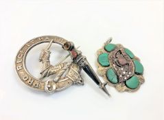 Two Scottish silver brooches and a pendant (3)