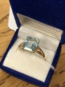 A 14ct gold blue topaz ring,